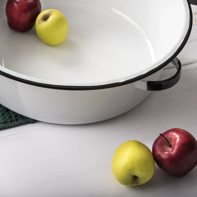 White enamel dish pan with apples