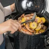 Serving from the black stockpot