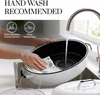 Hand washing the white roaster