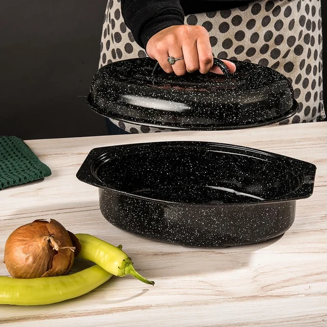 Lifting the lid of the 13-inch oval roaster